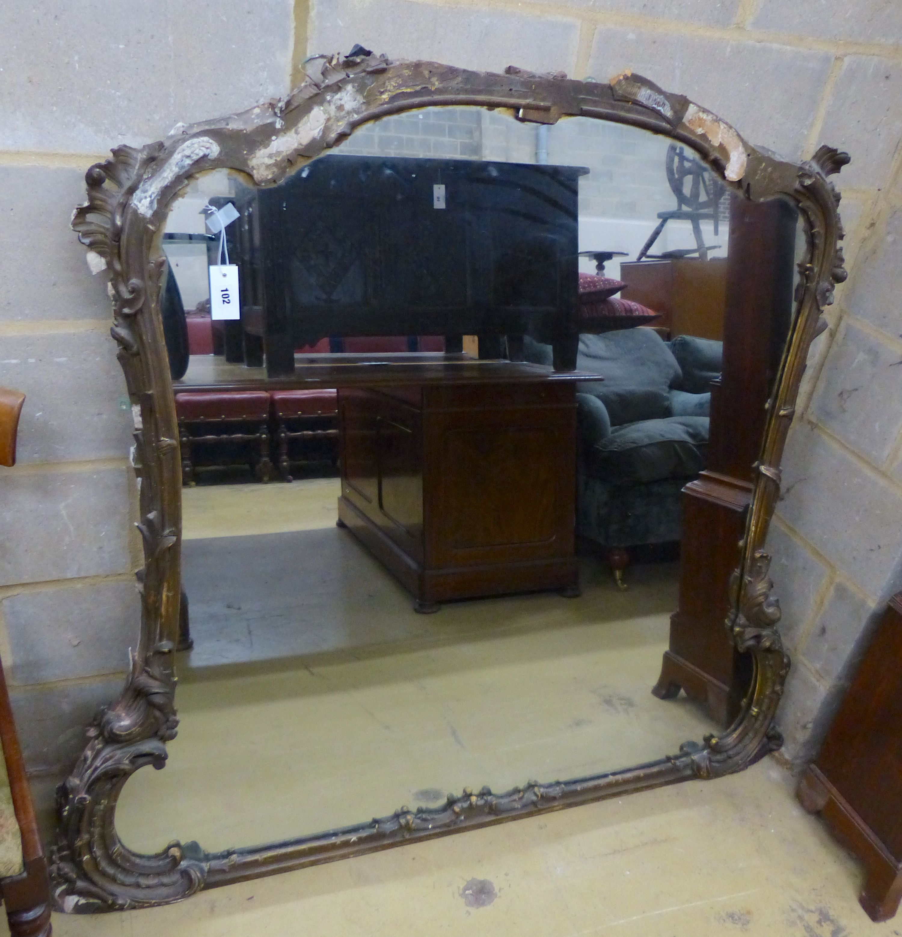 A Victorian carved and giltwoodovermantel mirror (a.f), width 152cm